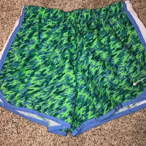 Patterned green Nike shorts